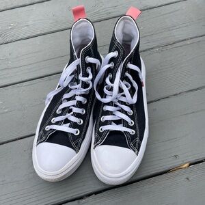 Converse Black and White High-Tops with Pink Trim